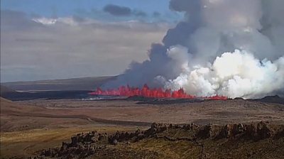 Lava spews from volcano fissure