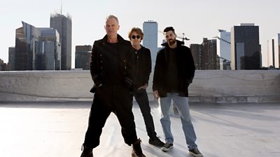 sting with  drummer Chris Maas and guitarist Dominic Miller on the roof of a building in a city