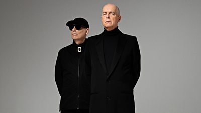 neil tennant and Chris Lowe of pet shop boys wearing all black 