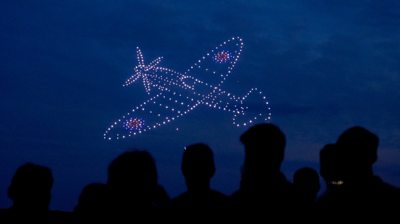 light show image of a plane