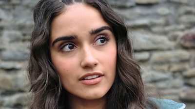 Close-up photo of Asha Banks as Cara