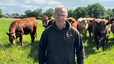 John Egerton with his cows