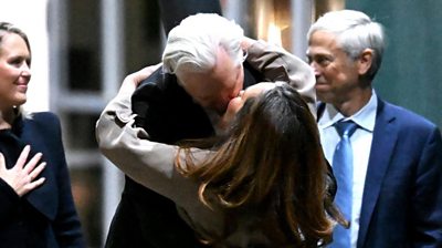 Julian and Stella Assange embra and kiss