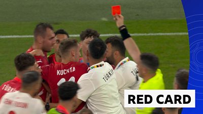 Red card being given after full-time whistle