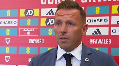 Craig Bellamy talks to the media