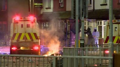 Fire next to police land rover