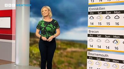 Sarah Keith-Lucas standing in front of weather graphics in a news studio