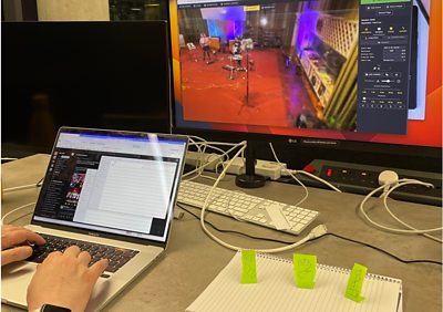 Using post-it notes on a sheet of paper while watching a monitor