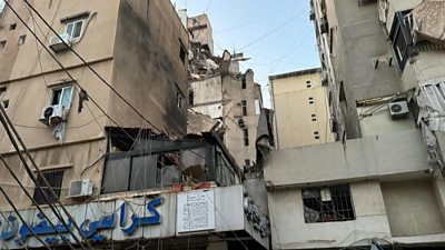 Building damaged after reports of an air strike on Beirut
