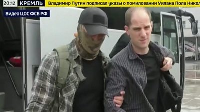 Russia TV clip showing Evan Gershkovich being escorted