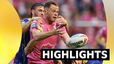 Hull KR's Joe Burgess is tackled with the ball