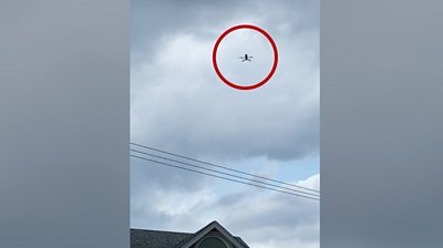 Drone flies over a home in New York