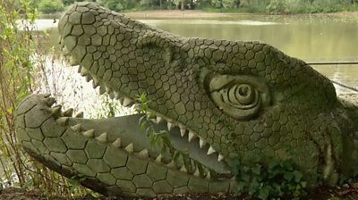 A crocodile sculpture in Crystal Palace Park