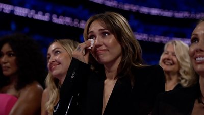 Miley Cyrus reacts as she is honoured at the 2024 Disney Legends Awards