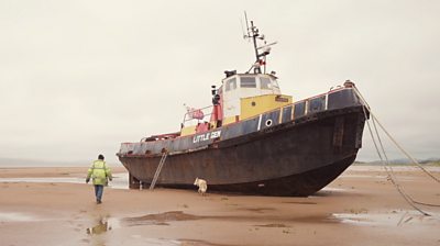 Davy Keenan walking towards his boat Little Gem