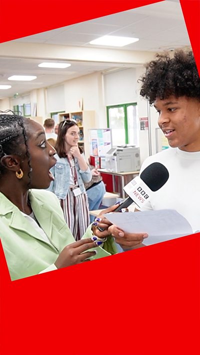 BBC presenter with student opening results envelope. Presenter looks surprised