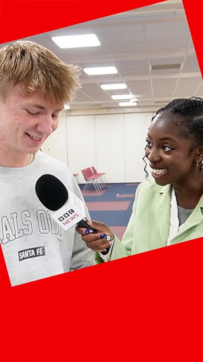 BBC presenter looking happy with student smiling and holding results