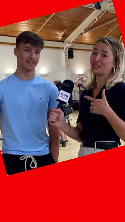 BBC presenter points at student as she talks to him about his results