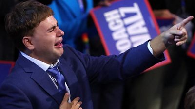 Gus, the son Tim Walz, reacts to his father's speech tearfully