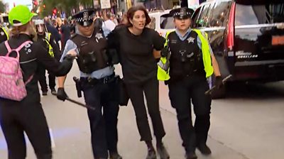 Woman being arrested in Chicago