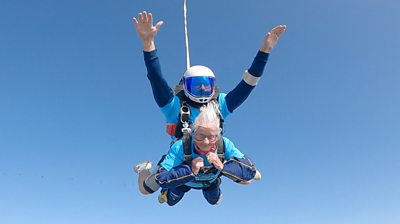 Manette and instructor skydiving