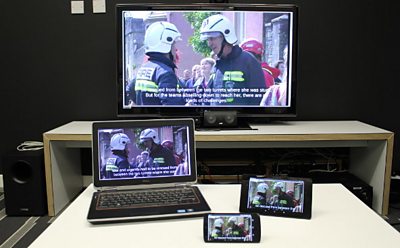 Subtitled firefighters on various screens