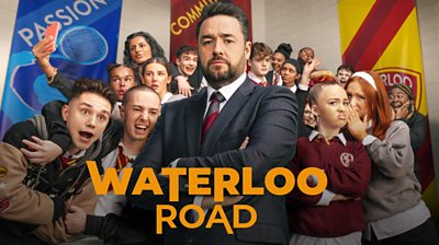 Artwork for Waterloo Road series 14 featuring Jason Manford as the new headteacher, Steve Savage, with his arms folded. A group of schoolchildren stand behind him, some are taking selfies, others are talking to friends, while others look directly to the camera. 