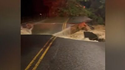 A road collapsing with water underneath