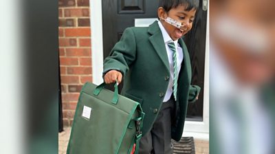 Noah in his school uniform