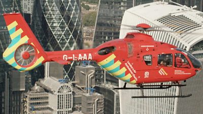 London's new air ambulance flying over the City of London