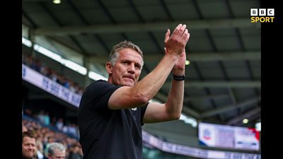 Phil Parkinson applauds the fans