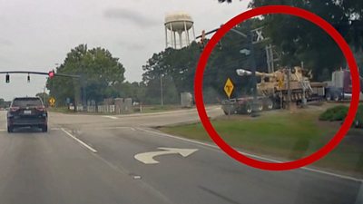 A circle around the tank moments before a freight train crashes into it