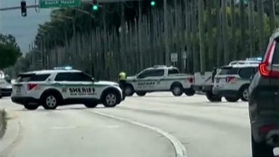 Police cars block road