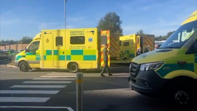 Picture of the ambulances holding patients waiting outside the Grange Hospital