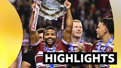 Highlights graphic over Wigan shield lift