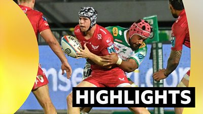 Scarlets' Tom Rogers is tackled by Toa Halafihi of Benetton in the United Rugby Championship