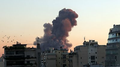 Smoke rises over buildings in Beirut