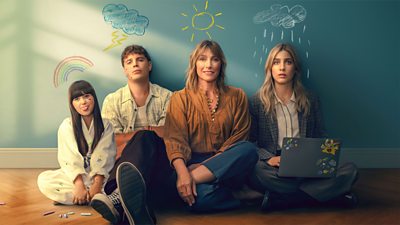 Characters Jacinda, Santi, Angie and Oly sitting on the floor against a wall. Each of them have a drawing above their head - a rainbow, stormy cloud, a sun, rain cloud