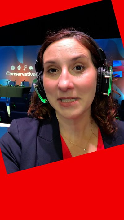 ý Correspondent, Helen Catt wearing headphones