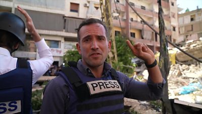 Hugo Bachega at scene of damage in Beirut suburb