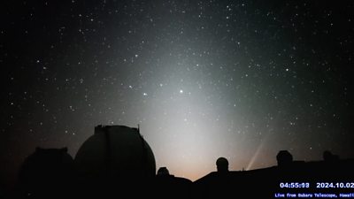 The night sky is seen with stars illuminating it.