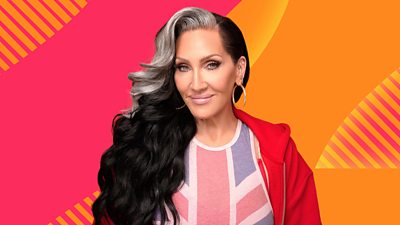 Picture of Michelle Visage in front of Radio 2 branding.