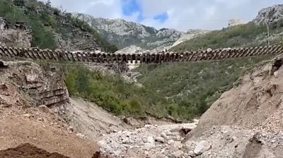 Train track left suspended in the air after landslides