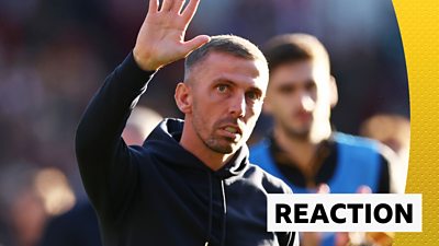 Gary O'Neil waves at the Wolves fans