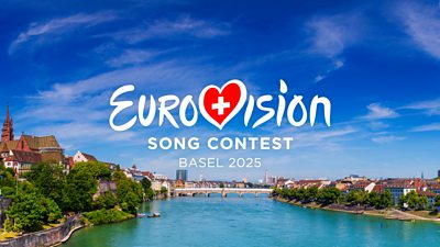 The Old Town of Basel with red stone Munster cathedral and the Rhine river, Switzerland. Eurovision Song Contest, Basel 2025 is written in white. The flag of Switzerland, a white cross on a red background, appears in the centre of a heart which replaces the V in Eurovision.