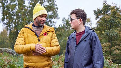 Sean Fletcher and Jack chat outside with trees in the background