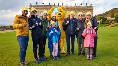 Sean Fletcher, Lucas, Matt Baker MBE, Rubi, Anita Rani, Pudsey, John Craven, Jack, Margherita Taylor and Sophie pose outside Chatsworth House, Peak District