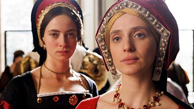 Lilit Lesser in character as Lady Mary. Dressed in fine clothing of the Tudor Period, she stands beside Meg Douglas (Agnes O’Casey) 