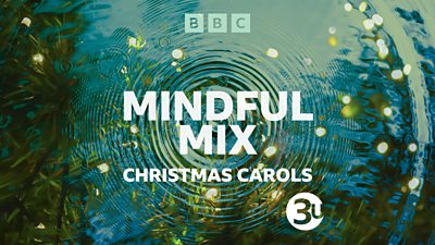 “Mindful Mix Christmas Carols” is written in bold, white text over a picture of fir branches, fairy lights, and a pool of water with gentle ripples running across the surface. 