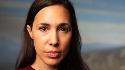 close up of woman looking to the camera